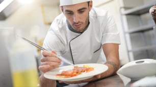 What is biological contamination in food safety?