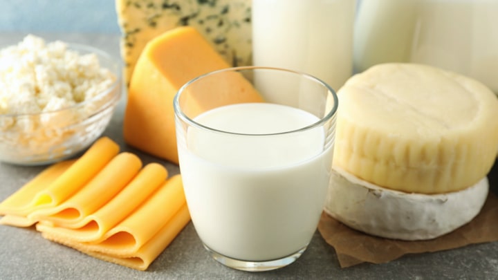 Various dairy products, including milk and cheeses.